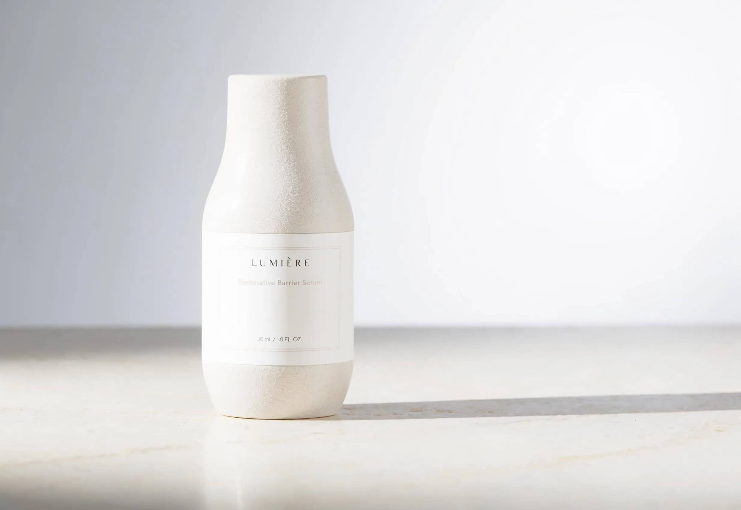 Packshot skincare Luma Uni-1 Max avec detail premium