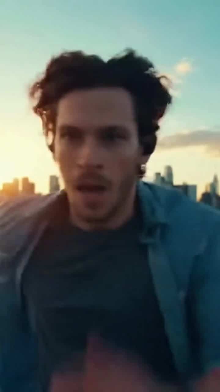 OpenAI Sora 2 AI video example: Logline A vertical, cinematic mini action scene where a spy-style hero runs like in a blockbuster trailer...