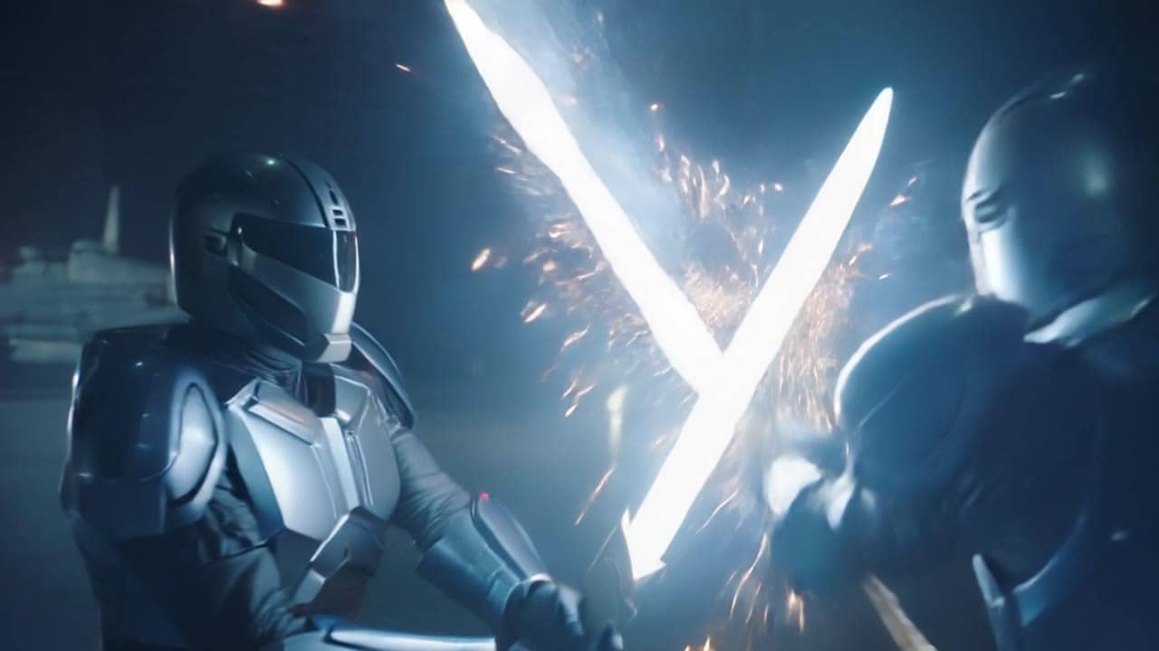 Kling 2.6 Pro AI video example: 10-second 16:9 cinematic shot in a futuristic hangar at night. Two armored fighters stand on a wet metal...