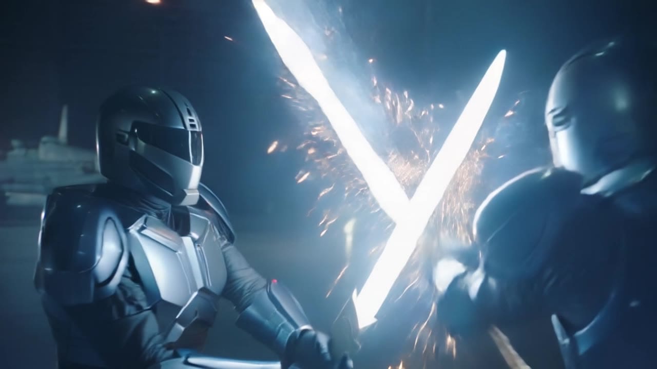 Kling 2.6 Pro AI video example: 10-second 16:9 cinematic shot in a futuristic hangar at night. Two armored fighters stand on a wet metal...