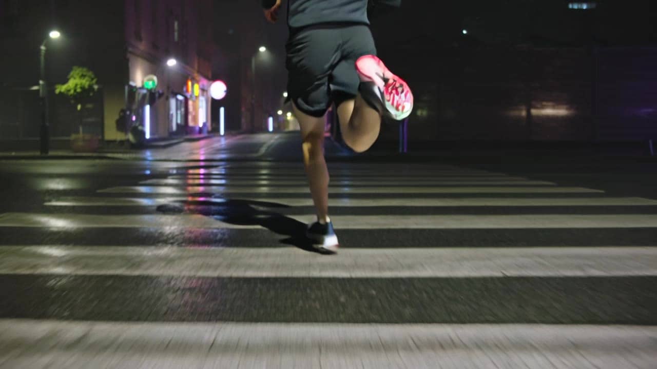 Kling 3 Standard AI video example: Multi-shot (Text→Video). 15s. 16:9. Audio: on. Scene anchors: Night city street after rain, wet asphal...